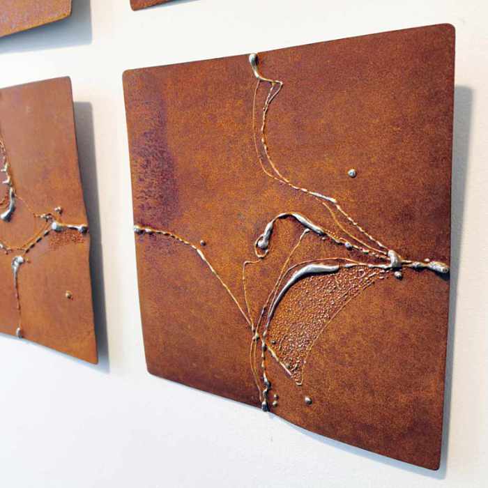 Geschweißtes Metallbild aus braunem Corten Stahl