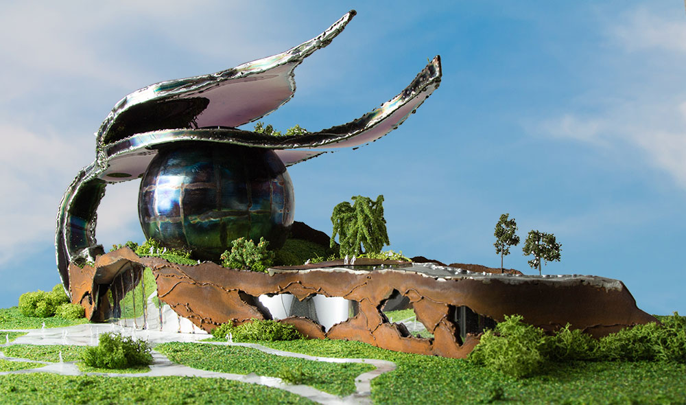 Art-house from metal, Plant-shaped building made of rusted steel and colored stainless steel