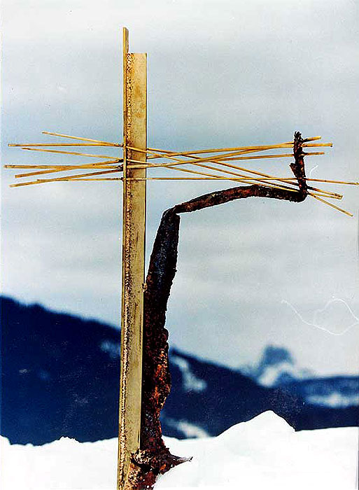 Bronze cross in abstract form