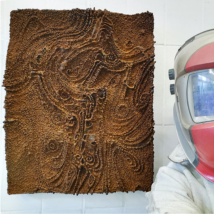 Wall Sculpture of Rusted Steel