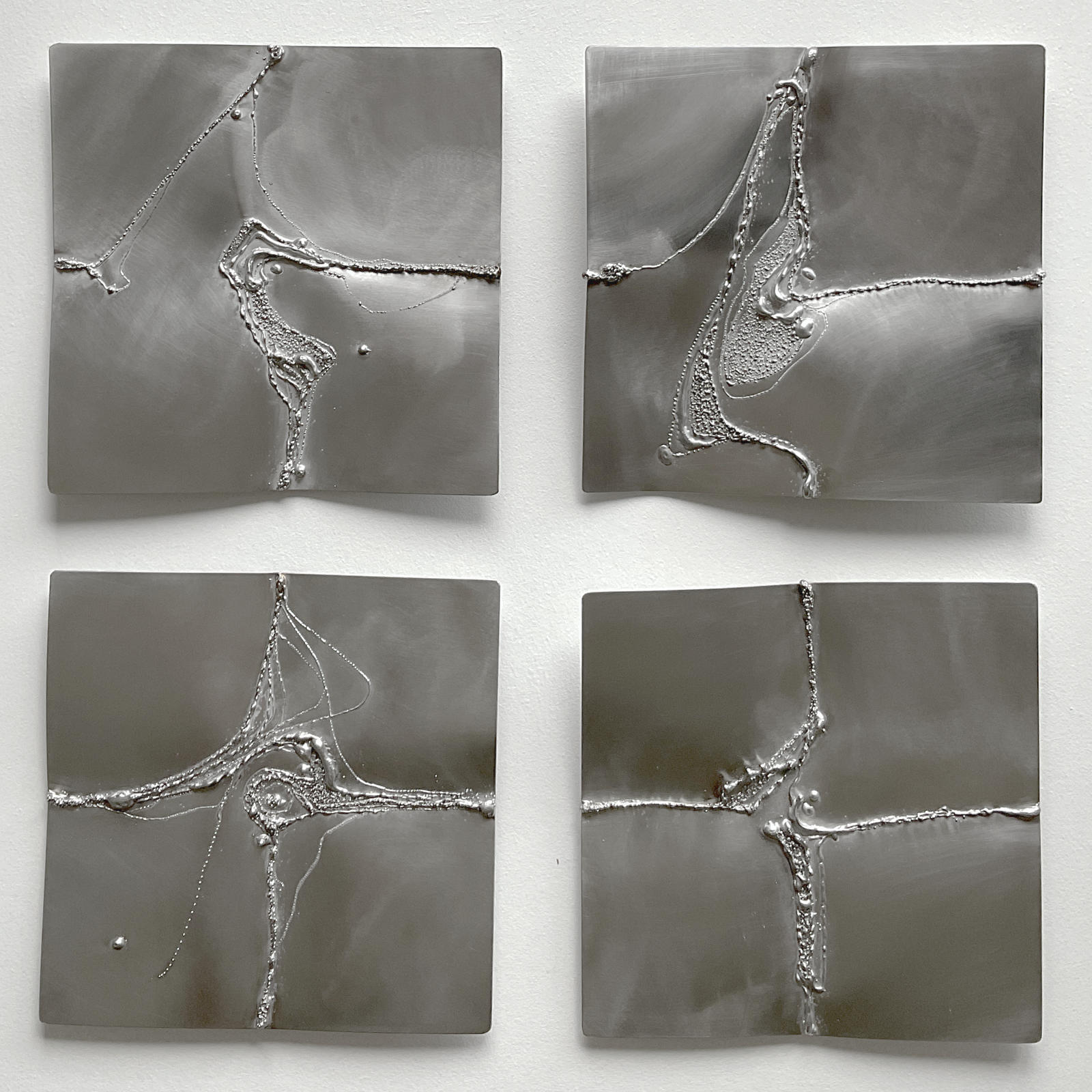 2x2 wall artwork in ground stainless steel without tarnish colors